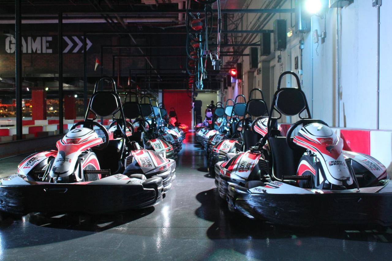 Royal M Hotel Fujairah By Gewan Экстерьер фото Kart racing at the K1 Speed indoor kart racing track in San Jose, California