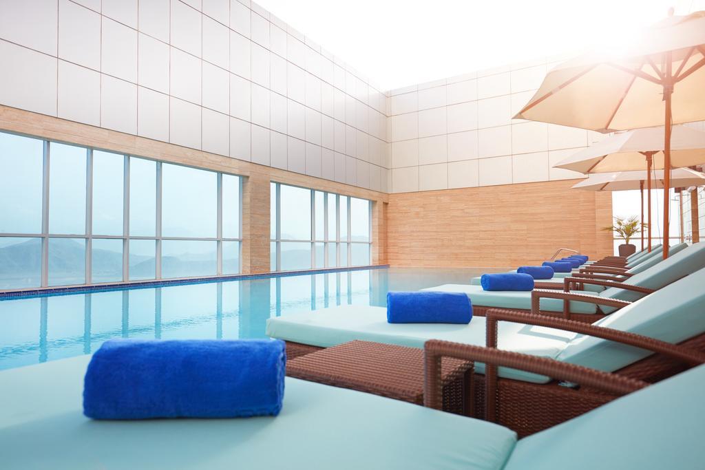 Royal M Hotel Fujairah By Gewan Экстерьер фото The swimming pool at the 1018 Sky Lounge