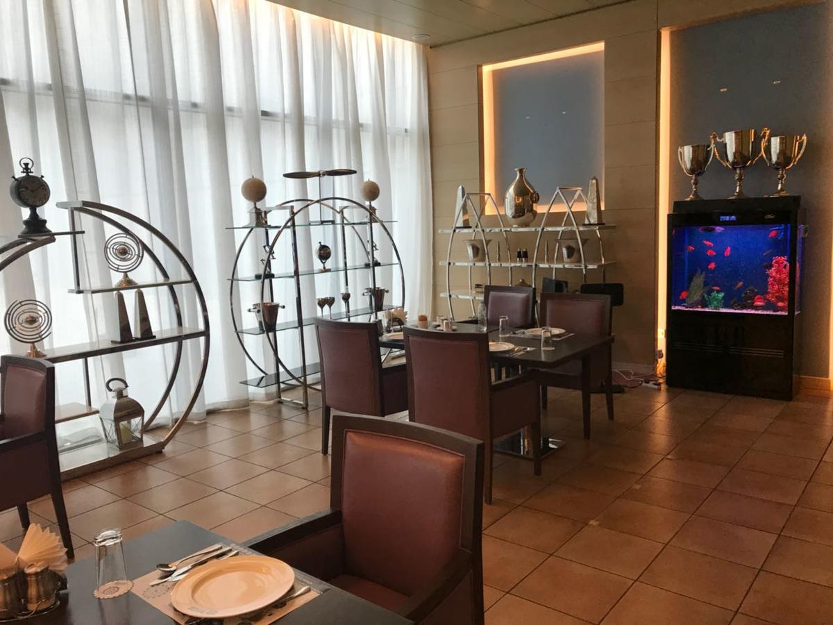 Royal M Hotel Fujairah By Gewan Экстерьер фото The interior of the restaurant